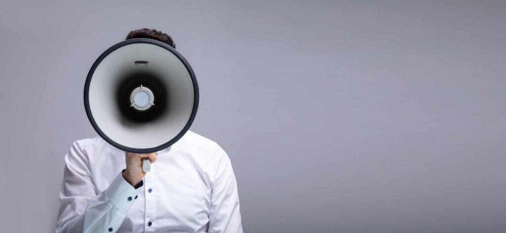 Man Doing Announcement On Megaphone