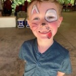 A young member proudly shows his face painting. CN/IC Employees Credit Union