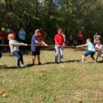 CN/IC Employees Credit Union young members play tug-of-war. CN/IC Employees Credit Union
