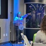 Julie Raines, CFO of Scenic Community Credit Union, gives a presentation on employee benefits. Scenic Community Credit Union