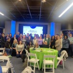 Employees from Scenic Community Credit Union gather for their All-Staff Meeting. Scenic Community Credit Union