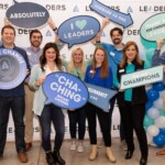 Financial champions gather for a fun photo opp at Leaders Credit Union's Annual Champion Summit event. Leaders Credit Union