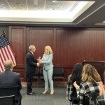 Sarah Waters, chief advocacy officer for the League, presents Congressman Rose with the Federal Legislator of the Year Award. Sarah Waters, TCUL chief advocacy officer, presents Congressman John Rose with the Federal Legislator of the Year Award.