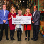 Ascend Federal Credit Union donates to Second Harvest Food Bank in 2018.