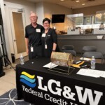 Diana Veazey, president and CEO of LG&W Federal Credit Union, stands with the board chairman.