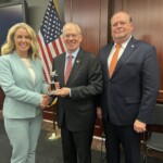 Sarah Waters, chief advocacy officer for the League, Congressman Rose, and Fred Robinson, president and CEO of the League, gather for a picture at the TriStar Advocacy presentation in March.