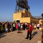 The Peabody Hotel's duckmaster leads the ducks during an exclusive rooftop duck march.