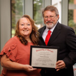 Stephanie Lawson, branch manager at Enrichment Federal Credit Union, graduates from the Southeast CUNA Management School.