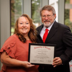 Stephanie Lawson, branch manager at Enrichment Federal Credit Union, graduates from the Southeast CUNA Management School.