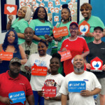The Canton, Miss., branch crew and members there celebrating why they love their credit union.