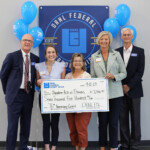 Random Acts of Flowers receives a grant from ORNL Federal Credit Union in honor of the credit union's 75th anniversary.