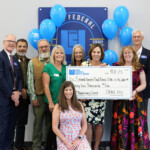Second Harvest receives a grant from ORNL Federal Credit Union in honor of the credit union's 75th anniversary.