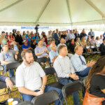 Community members attend the groundbreaking ceremony for Southern Security's new corporate office.