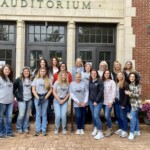 Copper Basin Federal Credit Union employees gather outside the Historic Ducktown School for the 58th Annual Meeting on International Credit Union Day.