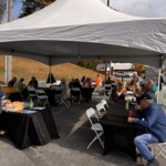 Bowater Credit Union hosts special member appreciation events at each of its branches on International Credit Union Day. Members at the Athens Branch enjoy a hotdog cookout and music from a local radio station.