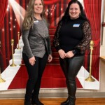 Kim Bohannon, chief innovation officer at the Tennessee Credit Union, and Melanie Buchanan, chapter officer, stand before the red carpet photo theme.