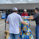 Knoxville TVA Employees Credit Union employees help provide water to those affected by Hurricane Helene.