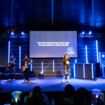 A local band performs at Leaders Credit Union's Champion Summit.