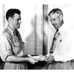 AJ Kessing made the first deposit into K-25 Employees Federal Credit Union. He was very involved in the Oak Ridge Community and later become the first President of the Oak Ridge Country Club.