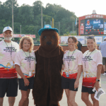 TVFCU employees gather with TVFCU's mascot, Mr. P, during Used Car Night.