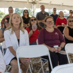 Attendees gather at Enrichment Federal Credit Union's groundbreaking ceremony.