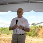 Rick Benson, board chair, speaks at the groundbreaking ceremony.