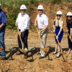 Tim Stallings, board member; Mike
Hayes, chief executive officer; Rick Benson, board chair; Amber Collins, chief operating officer; and Felicia
Langley, chief lending officer, break ground on Enrichment Federal Credit Union's new Emory Road Branch.