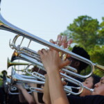 A local marching band performs at TVFCU's grand opening.