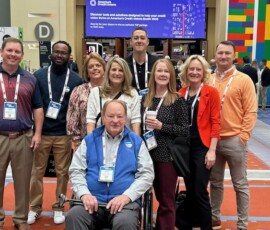 John Pogue and TVFCU leaders gather during the Governmental Affairs Conference a couple of years ago.