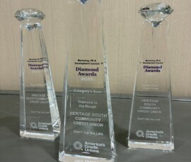 A photo of the three Diamond awards earned by Heritage South Community Credit Union.