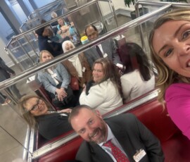 Sarah Waters and credit union leaders on the Capitol Subway System.