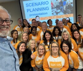 Third-year students take a break from scenario planning for a quick photo.