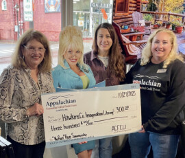 Appalachian Community Federal Credit Union makes a donation to the Hawkins County Imagination Library.