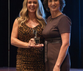 Sarah Waters, chief advocacy officer, presents the TriStar Advocate of the Year Award to Laura Parham, president and CEO of Heritage South Community Credit Union, for her work to advance credit union advocacy initiatives.