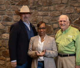 Enbright Credit Union receives a marketing award for the Credit Union for Kids Golf Tournament.