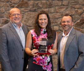 Summers Townsend, executive vice president and COO at First South Financial, accepts the Hall of Fame Award in memory of Gaylon Hall, long-standing First South Financial board member.