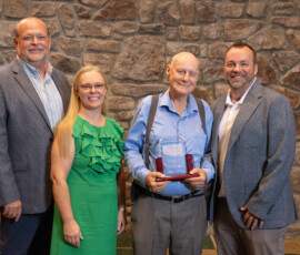 Myrl Vaughn, retired manager of AUB Employees Credit Union, is inducted into the Tennessee Credit Union Hall of Fame.