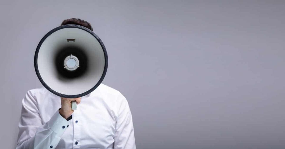 Man Doing Announcement On Megaphone